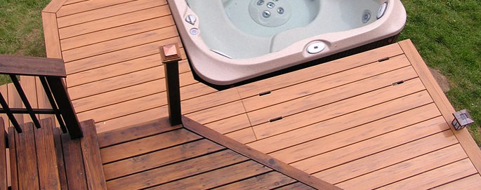 Deck with access hatch to access hot tub mechanicals