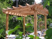 Cedar Pergola situated on a hardscape patio near Anacortes, WA 98221. This has become the favored place for the owners to read a book or enjoy a cold drink on a hot day.