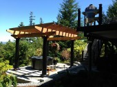 This Rough Sawn Red Cedar Pergola over hot tub in Anacortes, WA is supported by fiberglass
