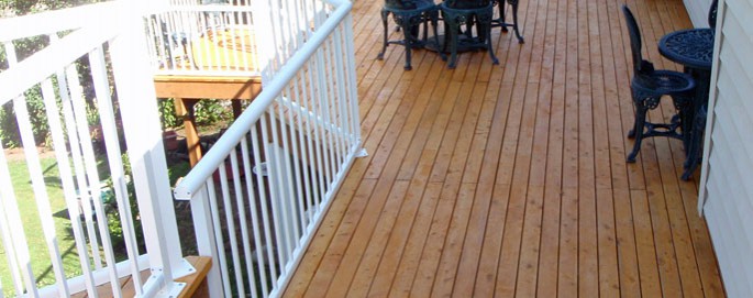 Beautiful yellow cedar decking and White aluminum railing.