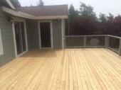 tight knot cedar decking installed with stainless steel screws. This project is located in Anacortes Washington
